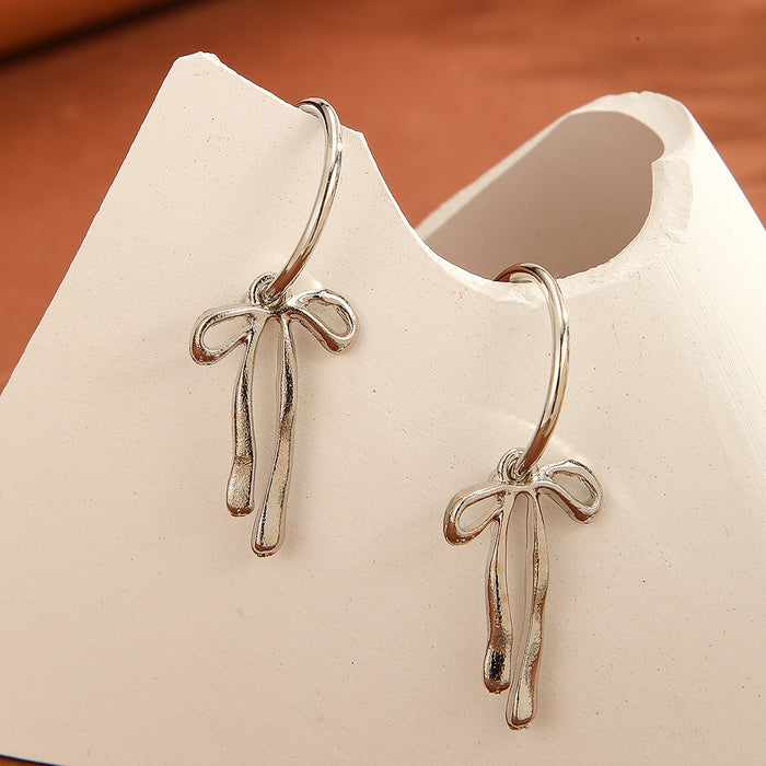 Wholesale Fashionable personalized metal bow earrings with a minimalist design and gold high sensitivity earrings