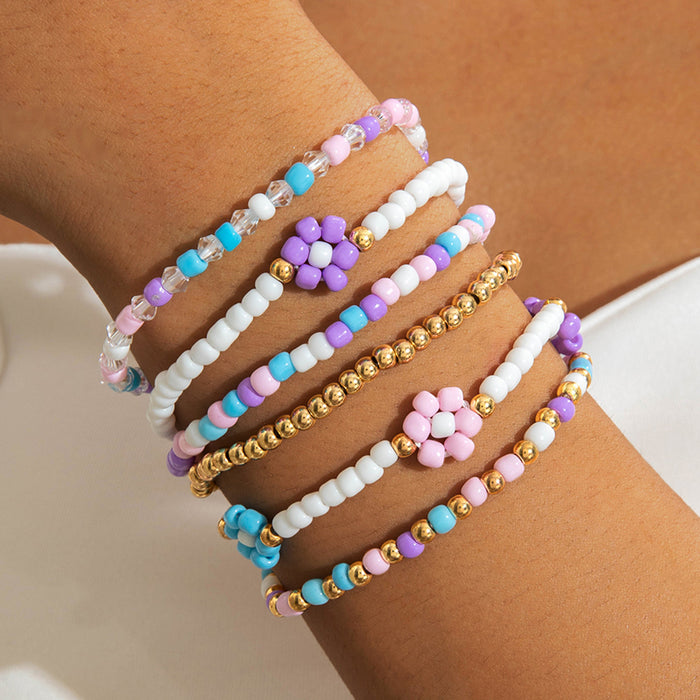 Wholesale Bohemian rice beaded multi-layer stacking elastic bracelet niche contrast color women' s bracelet set