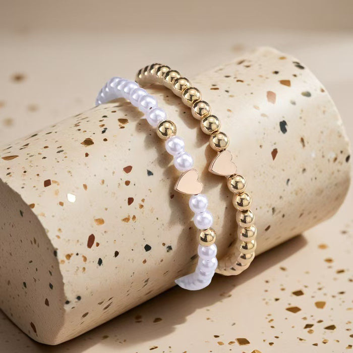 Wholesale Simple imitation pearl metal round bead heart-shaped bead bracelet set with adjustable drawstring bracelet