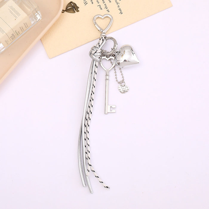 Wholesale Leather bow heart pendant luggage keychain lanyard accessories single buckle tassel pendant accessories