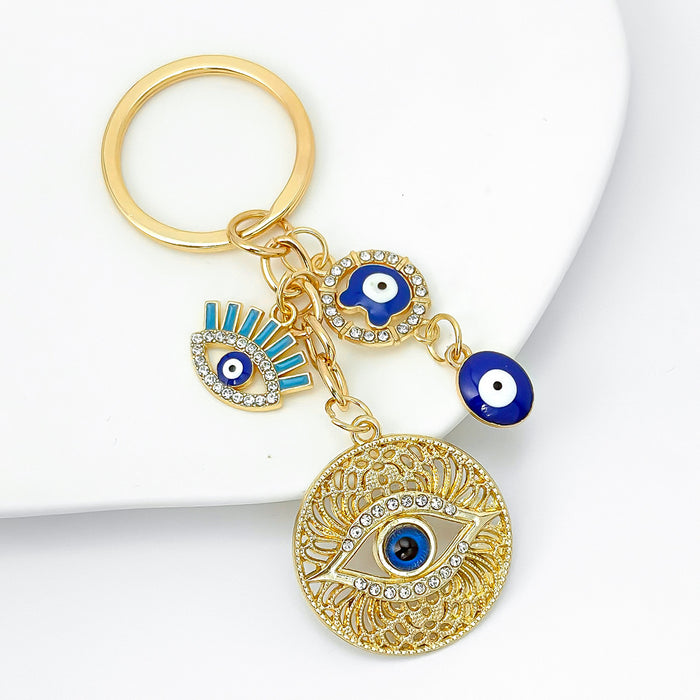 Wholesale Diamond-encrusted blue eyes evil eye tassel keychain