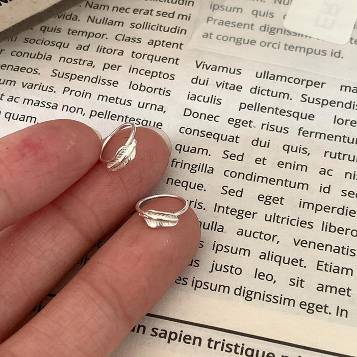 Wholesale Compact and minimalist leaf earrings with delicate and niche design, featuring metal leaf earrings