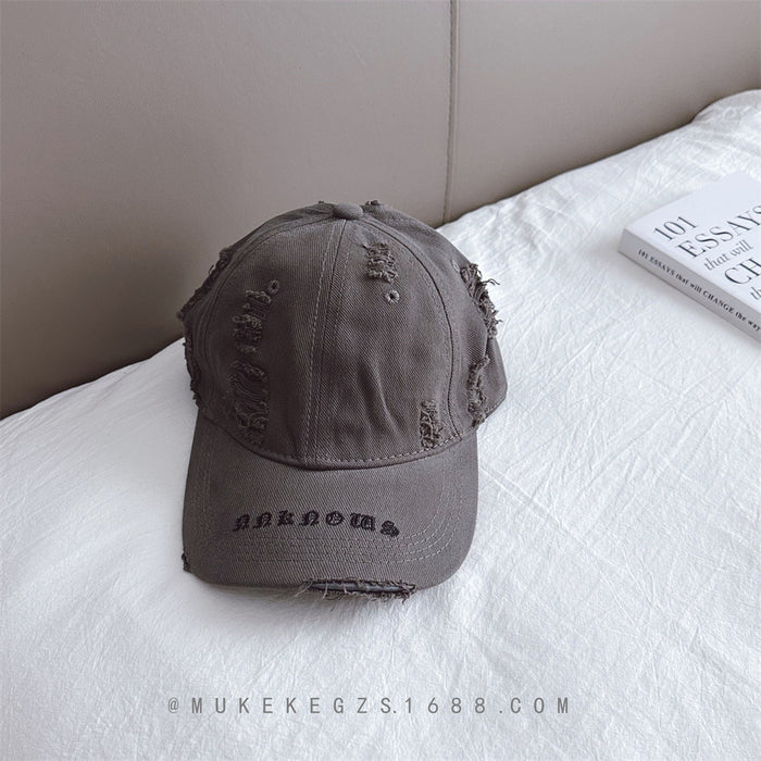 Wholesale Children's duckbill cap with worn holes, embroidered letters, fashionable sun shading baseball caps for boys and girls