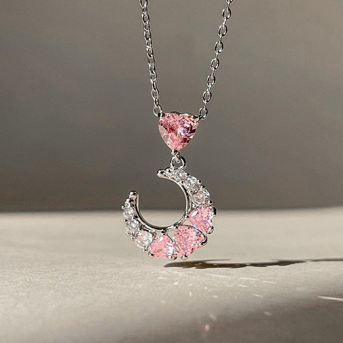 Wholesale Fashion and versatile jewelry with diamond studded heart pendant, personalized and niche alloy moon necklace