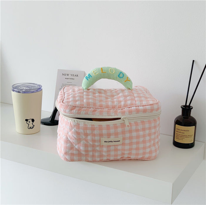 Wholesale plaid cosmetic bag large capacity high-end sense cute portable high-value storage bag