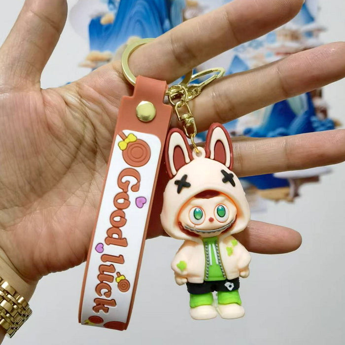 Wholesale Cute cartoon trendy schoolbag pendant keychain furry cute little monster