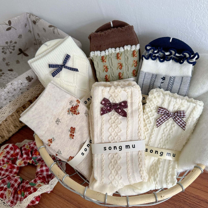 Wholesale Designer bow socks, children's mid tube socks, new niche original stacking socks