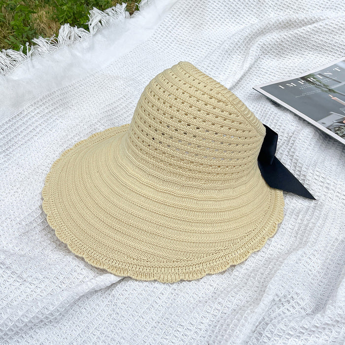 Wholesale New curled edge hollow knitted sun hat temperament bow top hat large brim foldable fisherman hat