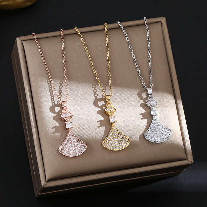 Wholesale Titanium steel necklace with a small dress pendant encrusted with rhinestones.