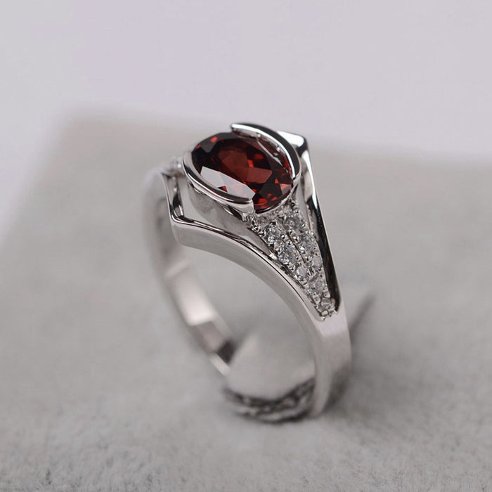 Wholesale Ring set garnet red zircon