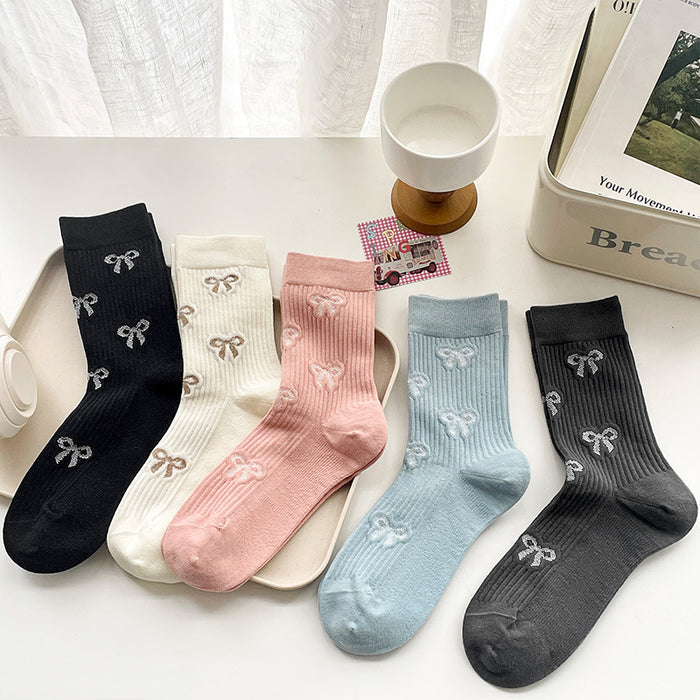 Wholesale Butterfly knot socks, children's mid tube socks, pile socks, boneless long tube socks, fashionable women's socks