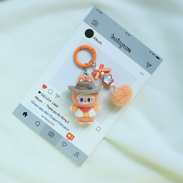 Wholesale Flocked denim car keychain doll jewelry pendant small fur ball cute grain pendant gift