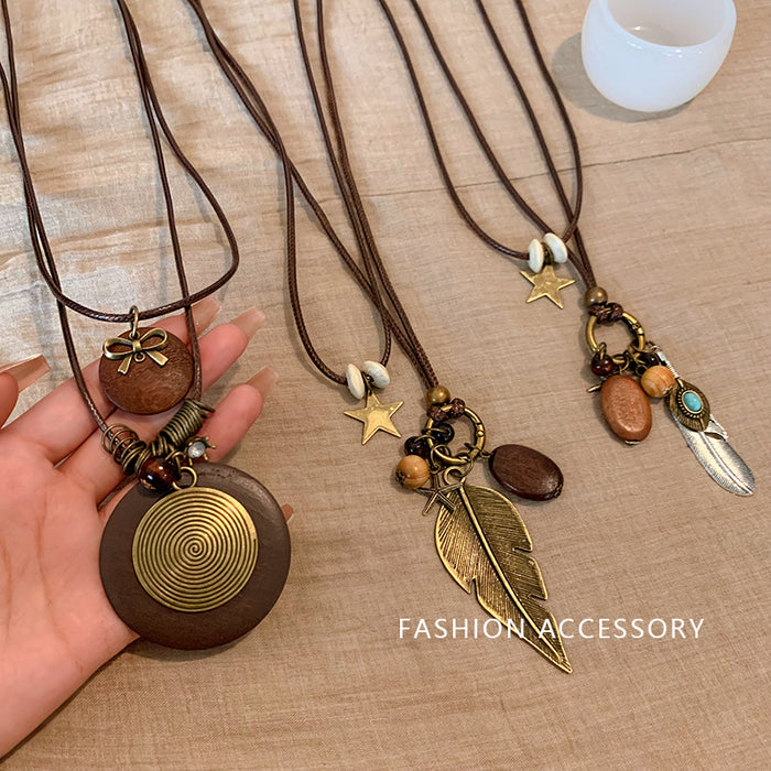 Wholesale Vintage feather necklace, double-layer layered long sweater chain accessory