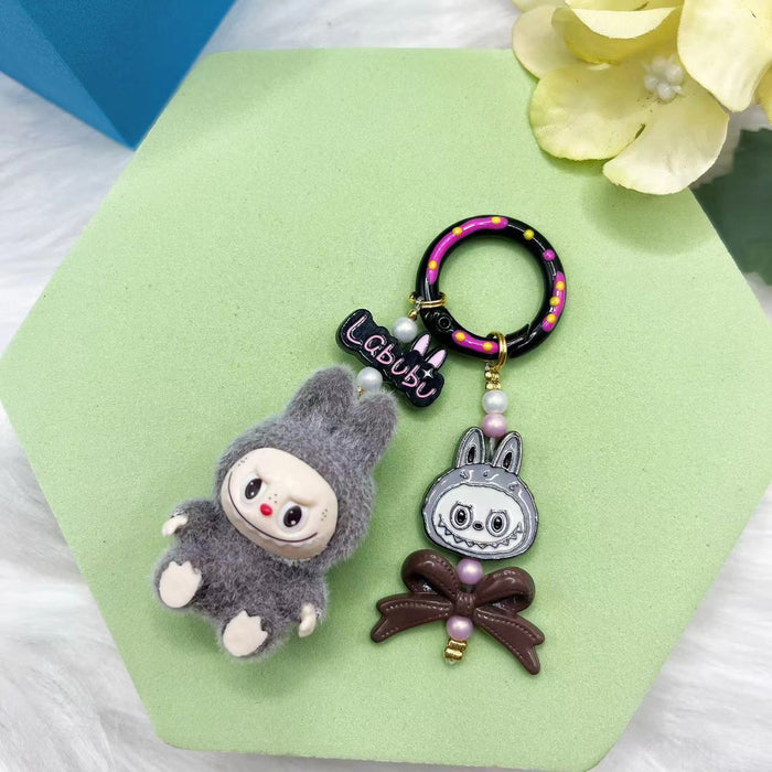 Wholesale Flocking mini keychain baby-free vinyl cute grain mobile phone pendant trendy accessories
