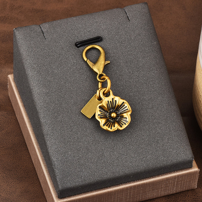 Wholesale Car key pendant high sense bag accessories gold color bear cherry four-leaf clover butterfly schoolbag jewelry