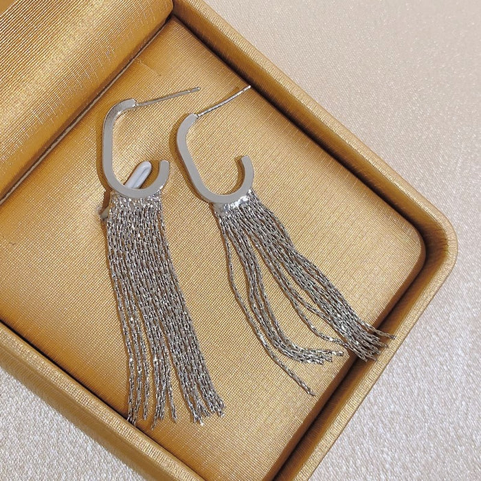 Wholesale Gold long tassel pick up Huan temperament big face suitable earrings niche design high-end all-match earrings