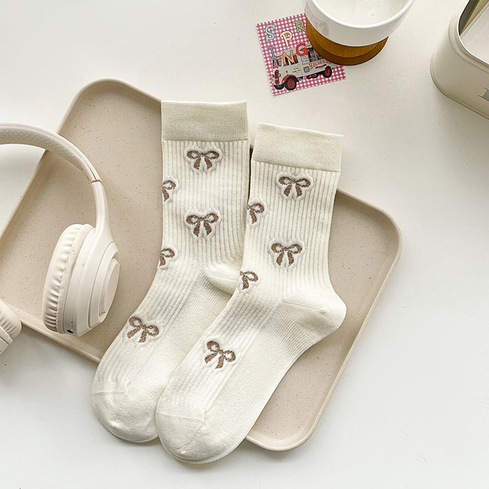 Wholesale Butterfly knot socks, children's mid tube socks, pile socks, boneless long tube socks, fashionable women's socks