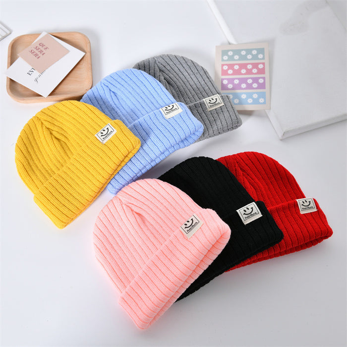 Wholesale Casual, fashionable, warm knit hat, cute smiling face pullover hat