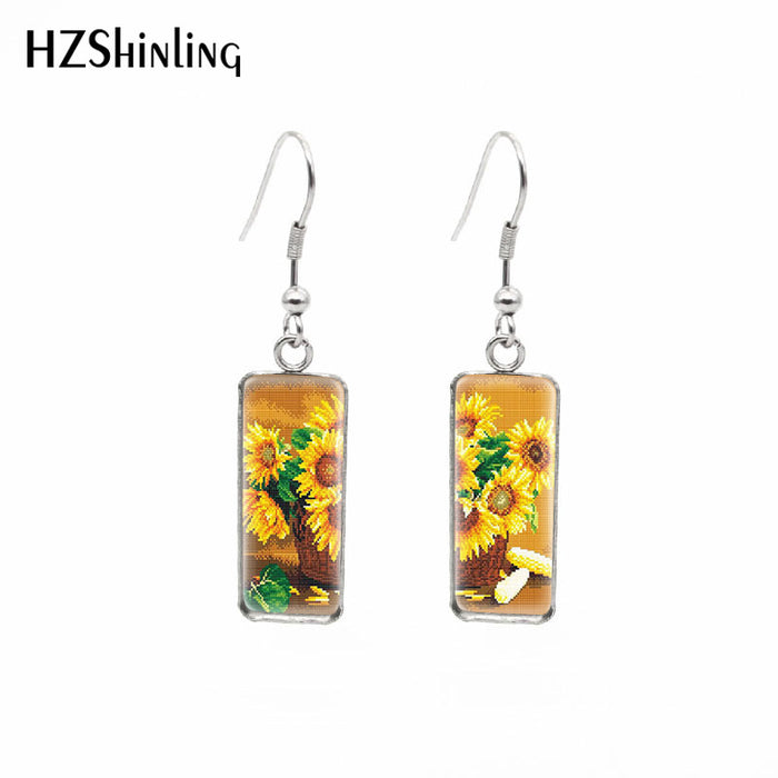 Wholesale Independently packaged hook flower pendant earrings, creative time gemstone earrings