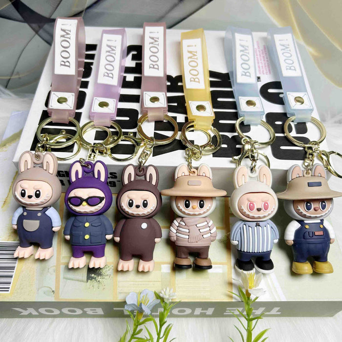 Wholesale Cartoon soft plastic cute little monster keychain pendant small gift ornaments,  back to school season