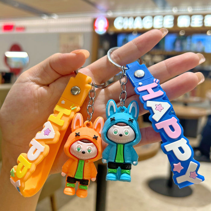 Wholesale Cute cartoon silicone keychain with cute little monster keychain for sweatshirt
