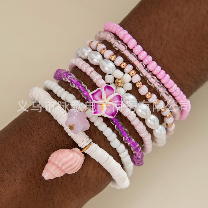 Wholesale Bohemian rice beaded multi-layer stacking elastic bracelet niche contrast color women' s bracelet set