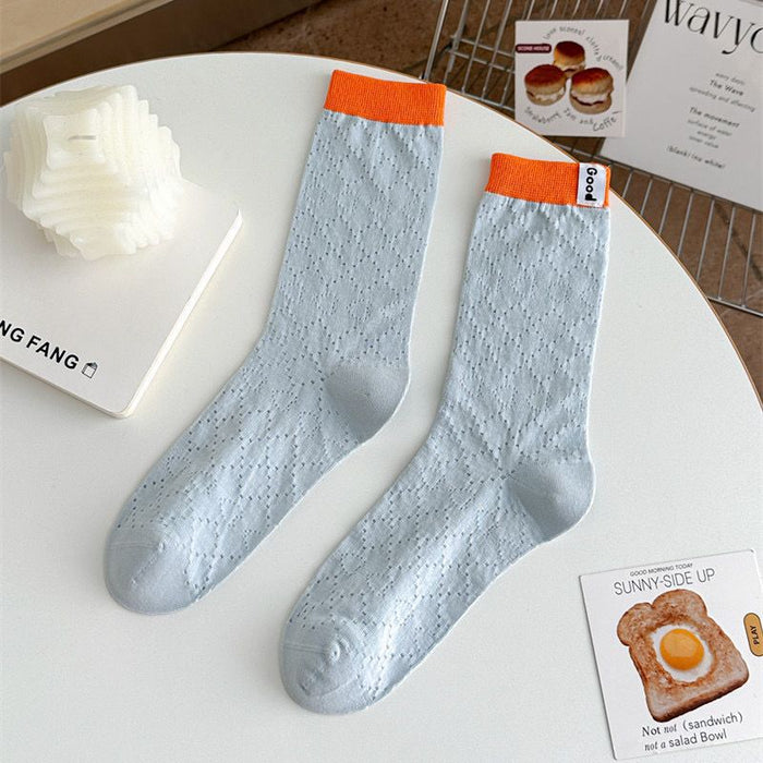 Wholesale Color blocked socks with hollowed out mesh and breathable lettering fabric label, colored midsole socks