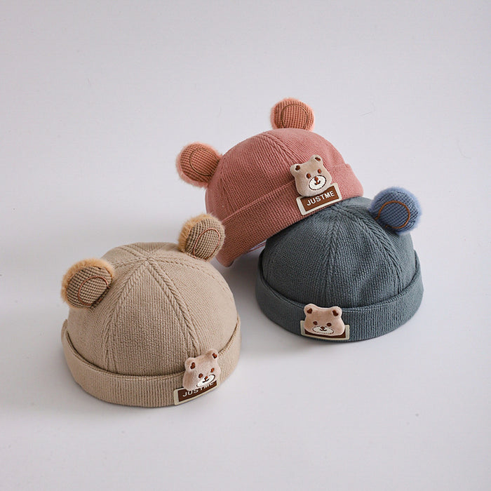 Wholesale Cartoon bear head in autumn and winter knitted thick children' s brimless duck tongue hat bear ears