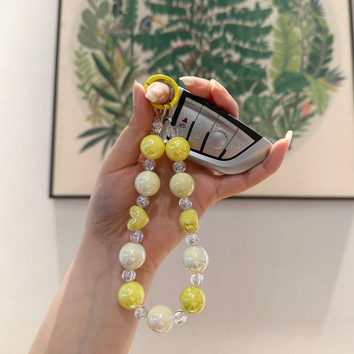 Wholesale Color plated bead peach heart colorful acrylic mobile phone chain dazzling love pendant accessories