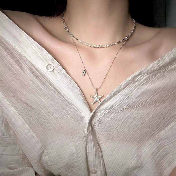 Wholesale Five pointed star pearl necklace, high-end necklace, light luxury, niche, layered sweater chain