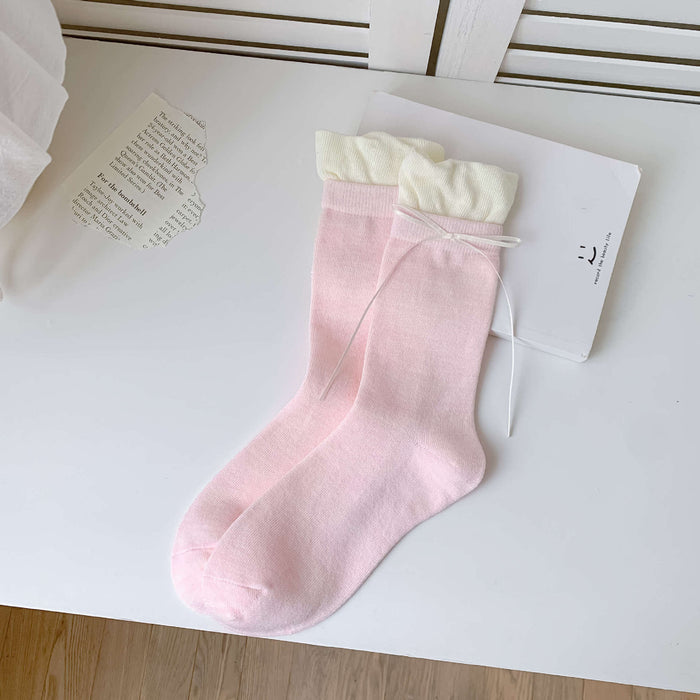 Wholesale Butterfly knot pile socks, cute and versatile pile socks