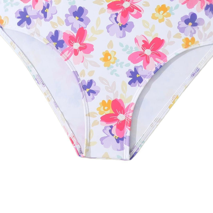 Wholesale Girls' one-piece swimsuit, children's one-piece shoulder strap, cross suspender, hollowed out floral swimsuit