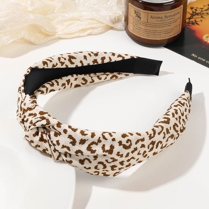 Wholesale Wide Edge Simple Fabric Leopard Knotted Headband JDC-HD-Yiyue001