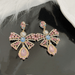 Wholesale Bow Rhinestone Pearl Earrings 925 Silver Post JDC-ES-jw002 Earrings 佳伟 Wholesale Jewelry JoyasDeChina Joyas De China