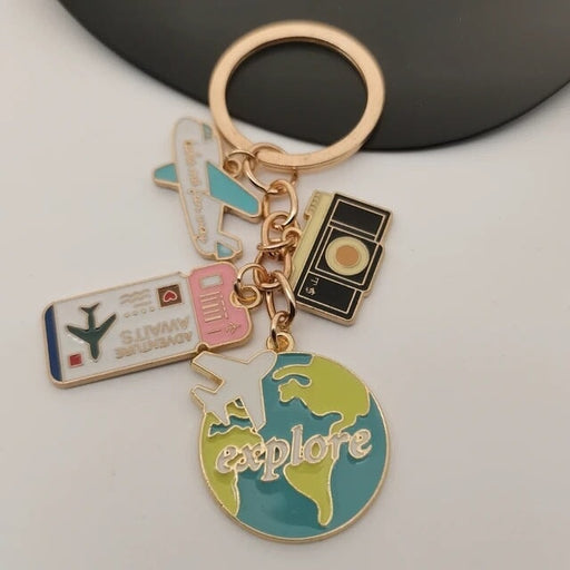 Wholesale cartoon aircraft camera world map air ticket combination alloy keychain jewelry Keychains JoyasDeChina Wholesale Jewelry JoyasDeChina Joyas De China