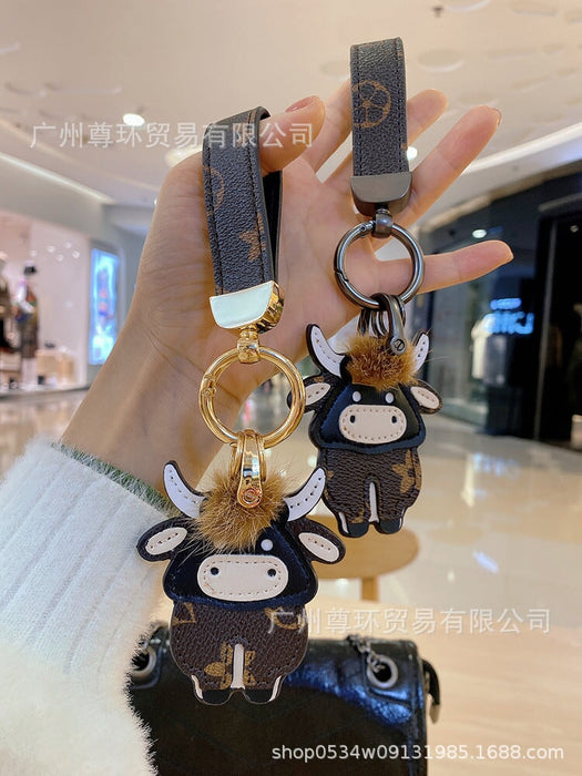 Wholesale Cartoon Classic Old Flower Cow Keychain Toy Bag Pendant Female Cute Male Couple Backpack Decorative Accessories Keychains JoyasDeChina Wholesale Jewelry JoyasDeChina Joyas De China