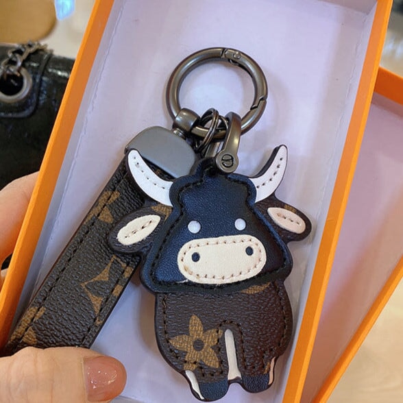 Wholesale Cartoon Classic Old Flower Cow Keychain Toy Bag Pendant Female Cute Male Couple Backpack Decorative Accessories Keychains JoyasDeChina Bullish C 0006688999 Wholesale Jewelry JoyasDeChina Joyas De China