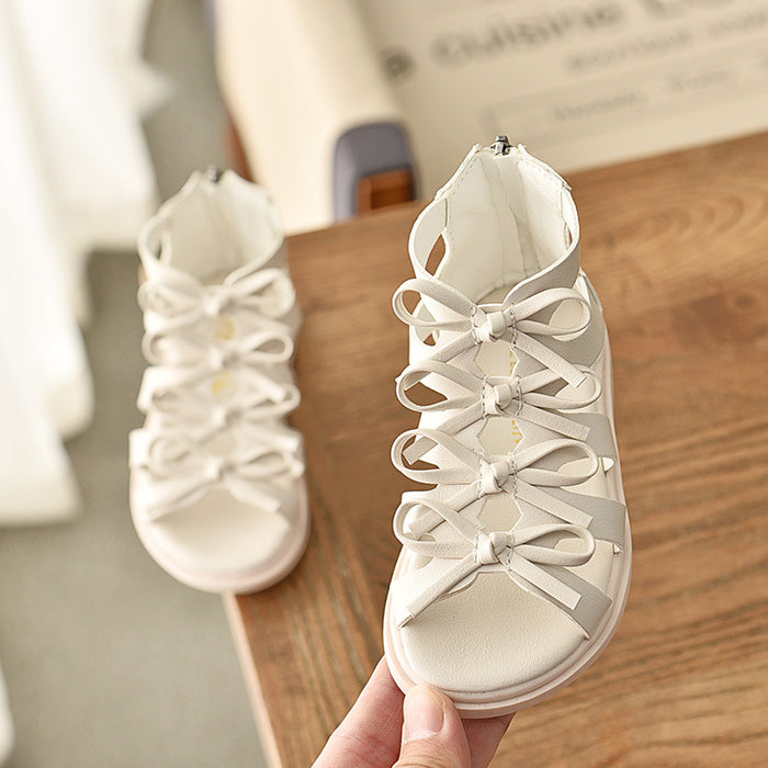 Sandalias de chicas al por mayor Sandalias de zapatos romanos de cuero suave JDC-SD-MAIQ001