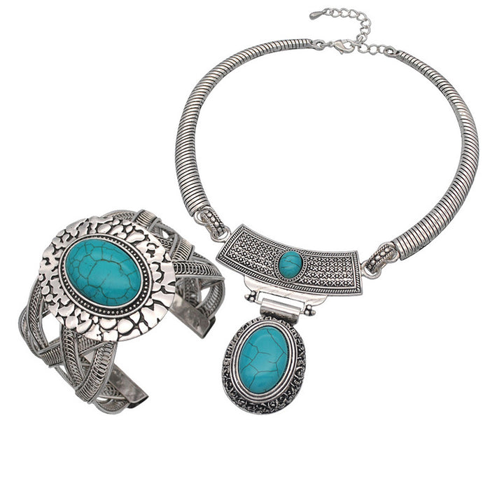 Collar al por mayor Pendientes de collar de turquesa Combinación de pulsera de anillo Juego JDC-NEOUF001