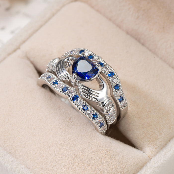 Conjunto al por mayor de tres piezas de joyas de circón azul sosteniendo el anillo de joyería de amor jdc-rs-longy021