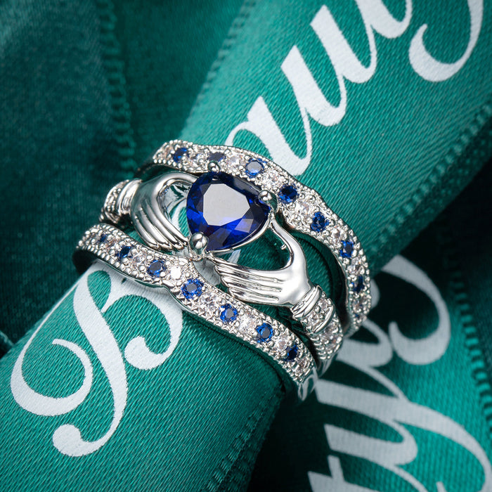 Conjunto al por mayor de tres piezas de joyas de circón azul sosteniendo el anillo de joyería de amor jdc-rs-longy021