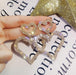 Jewelry WholesaleWholesale diamond-set double heart alloy earrings JDC-ES-Shuangd004 Earrings 双笛 %variant_option1% %variant_option2% %variant_option3%  Factory Price JoyasDeChina Joyas De China