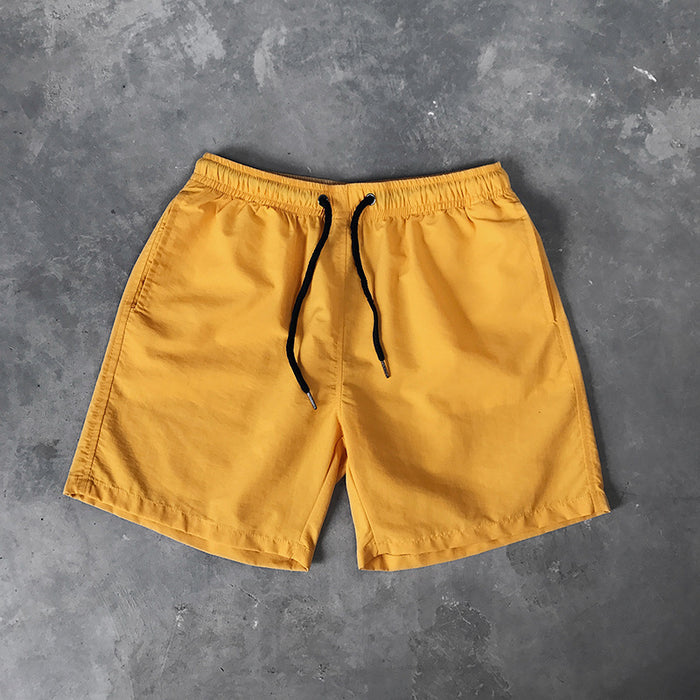 Wholesale men's beach shorts five points shorts loose waterproof surf swimming trunks JDC-SW-Chengj001