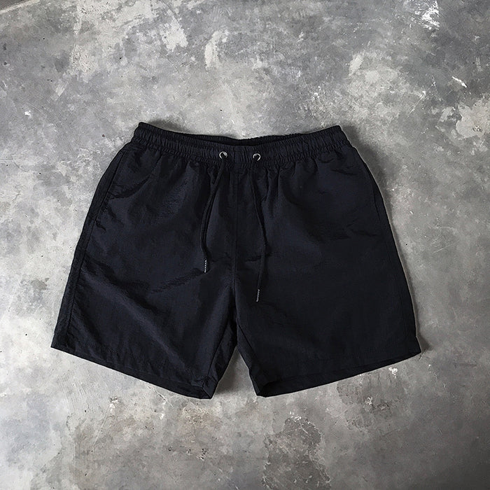 Pantalones cortos de playa para hombres al por mayor cinco puntos pantalones cortos impermeables a prueba de agua bañadores jdc-sw-chengj001