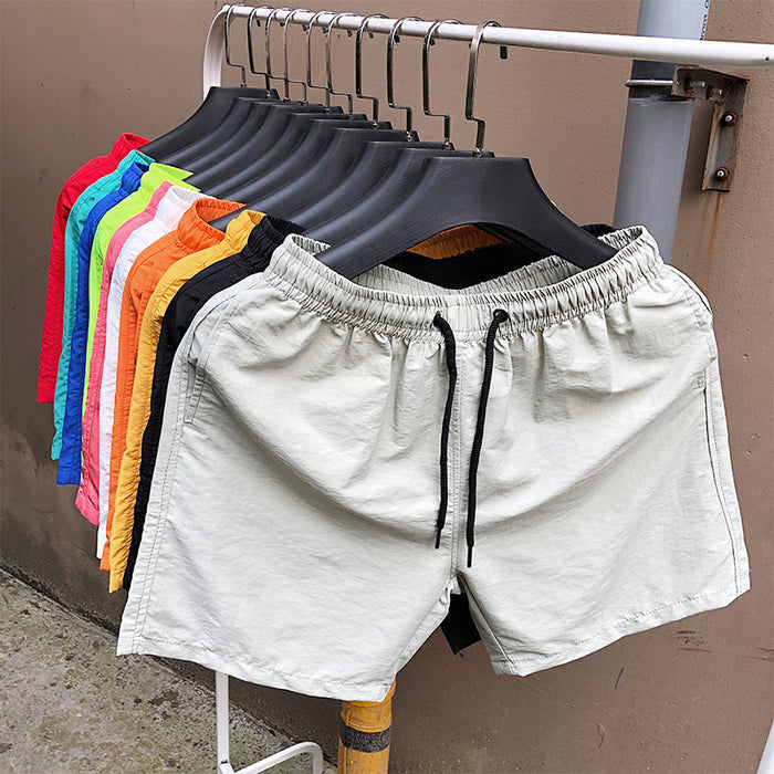 Pantalones cortos de playa para hombres al por mayor cinco puntos pantalones cortos impermeables a prueba de agua bañadores jdc-sw-chengj001