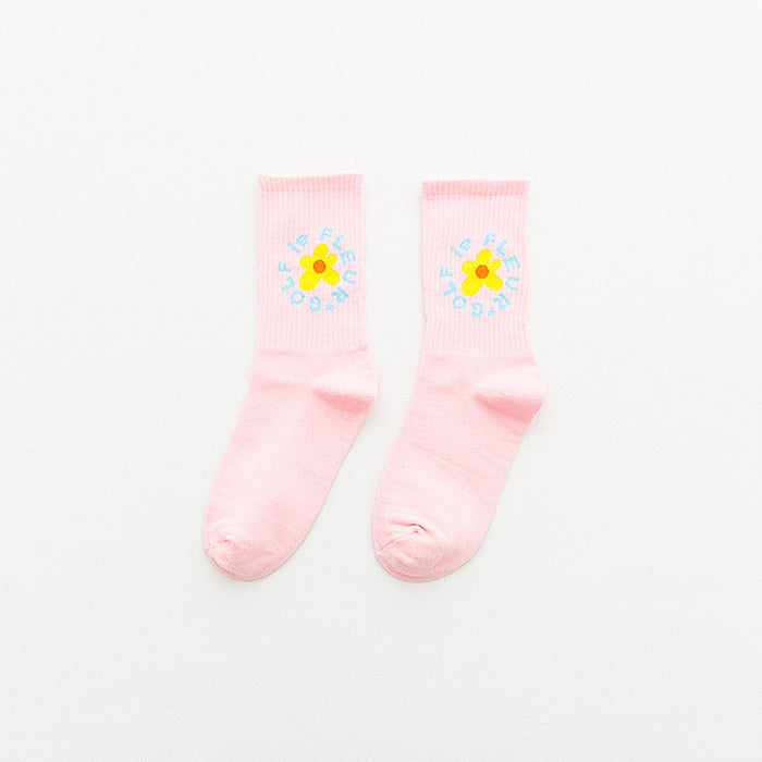 Calcetines de tubo medio al por mayor tendencia de algodón de flores salvajes calcetines de estilo universitario de tubos