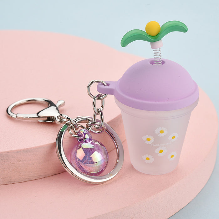 Wholesale swing grass potted milk tea cup with light keychain JDC-KC-YPin010