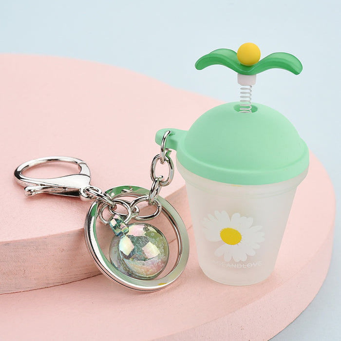 Wholesale swing grass potted milk tea cup with light keychain JDC-KC-YPin010