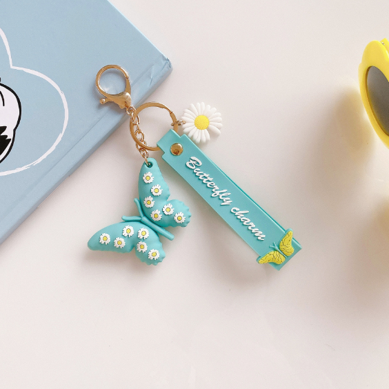Wholesale creative cartoon silicone small daisy butterfly car key chain JDC-KC-SCheng031