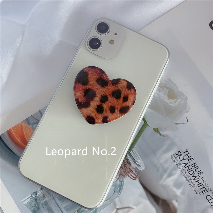 Wholesale Grips Mobile Phone Holder Leopard Print Heart Shaped Retractable Airbag Holder MOQ≥2 JDC-PS-weijiu009